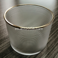 Vaso de vidrio transparente en relieve con borde dorado